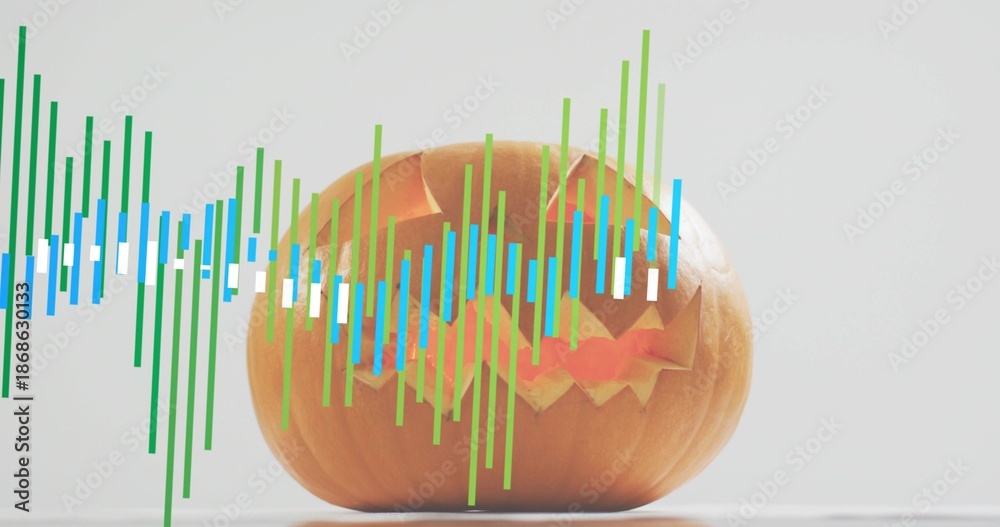 Fototapeta premium Glowing carved jack-o'-lantern pumpkin sitting on pale tabletop with green blue white waveform bars