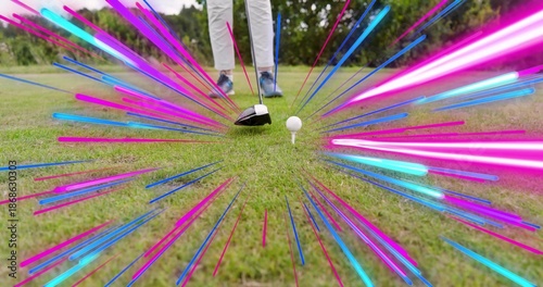 Quadro em tela Positioning female golfer lining up driver behind golf ball on tee box, blue sho