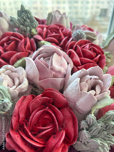 Marshmallow flowers of different colors close-up. The work of a marshmallow manufacturer entrepreneur.