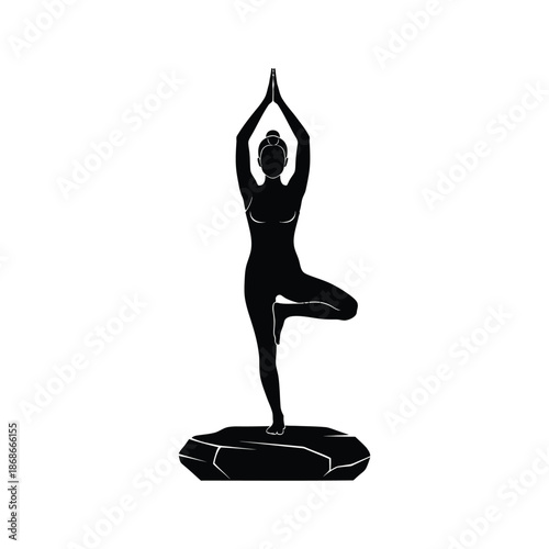 Silhouette of a Woman Performing Tree Yoga Pose on a Rock for Wellness Meditation