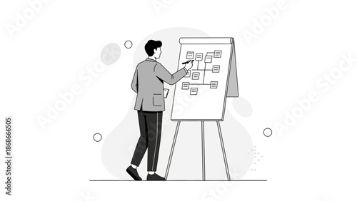 Man Drawing Flowchart on Flip Chart for Business Planning and Strategy