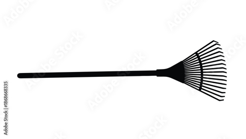 Black silhouette of a garden rake on a isolated on white background