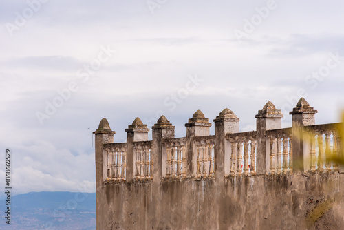 Ancient ramparts against a cloudy sky in the Kasbah of Algiers, Algeria.