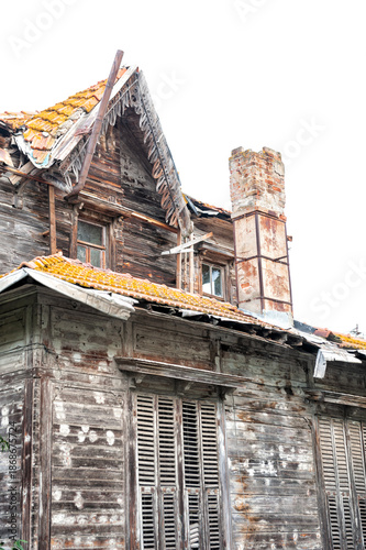 Abandoned wooden house shows decay