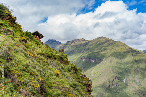 Scenic view overlooking the lush green landscape of the Sacred Valley of the Incas. View from Pisac Archaeological Site