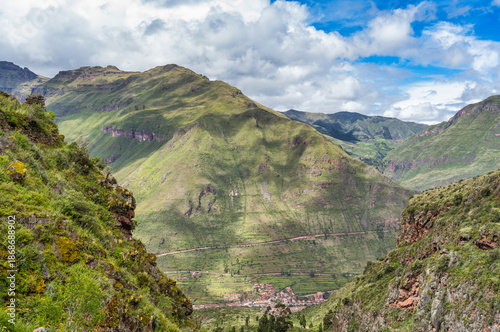 Scenic view overlooking the lush green landscape of the Sacred Valley of the Incas. View from Pisac Archaeological Site