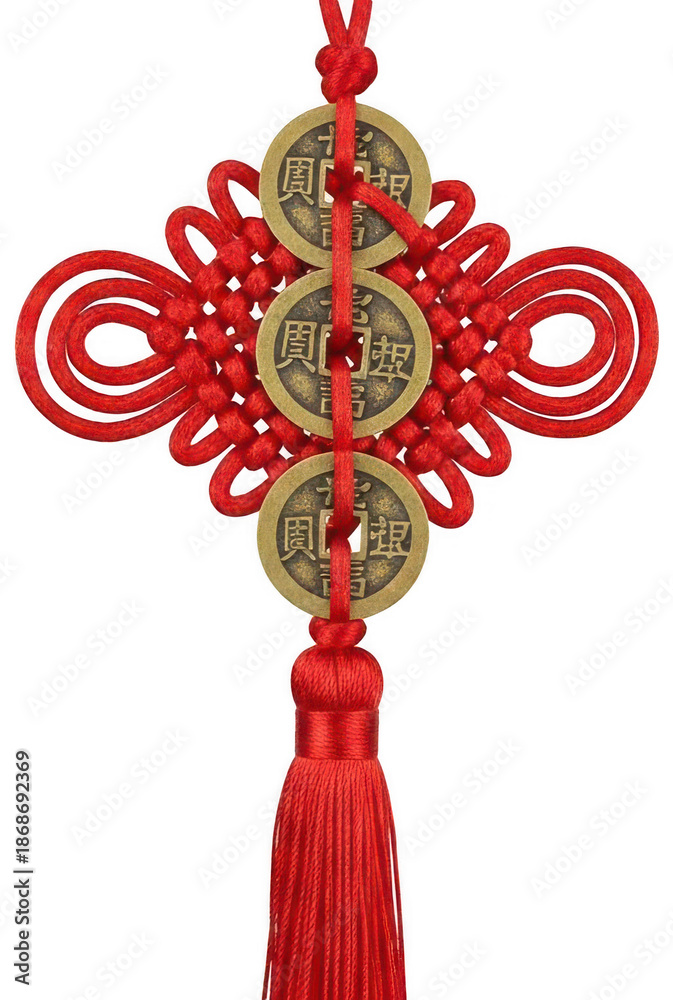 Obraz premium Traditional red chinese knot decoration with three antique bronze coins and tassel symbolizing wealth and good luck vertical orientation