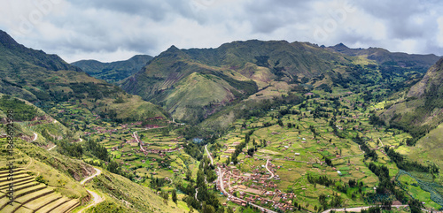 Scenic view overlooking the lush green landscape of the Sacred Valley of the Incas. View from Pisac Archaeological Site
