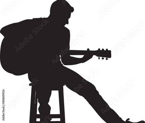 Silhouette of a person playing an electric guitar on a stool musician