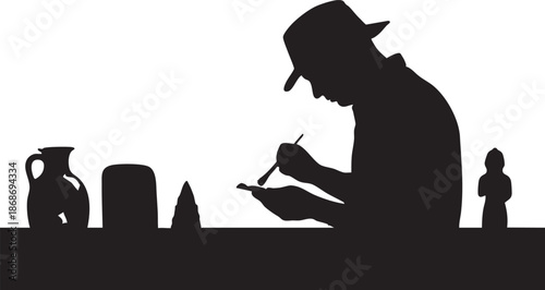 Silhouette of a person sculpting pottery with various pottery on a table vase