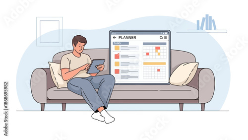 Man using tablet for planning and scheduling on sofa at home, digital lifestyle.