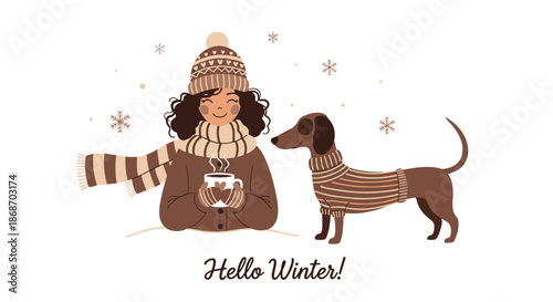 Happy girl and her dachshund dog both wearing matching striped sweaters enjoying a snowy winter day with hot cocoa.