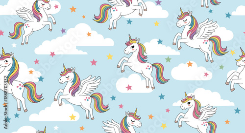 Whimsical seamless pattern featuring white unicorns with rainbow manes and tails jumping among soft white clouds and colorful stars on blue.