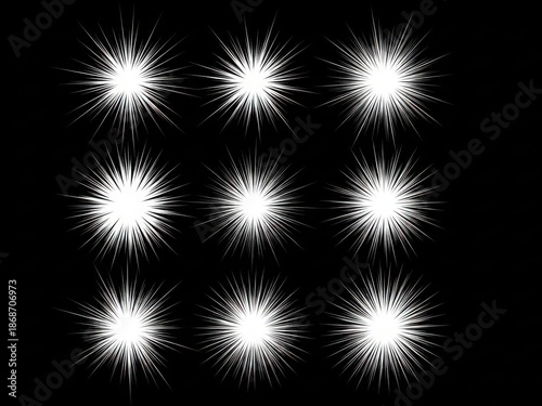Collection of white sparkling stars on black background