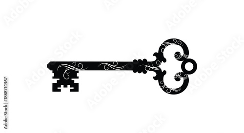 An ornate antique key design with swirling details presented as a striking black silhouette