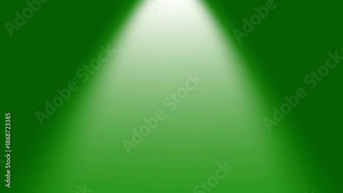 Vibrant green background with spotlight shining down