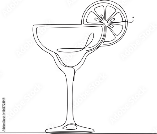 Elegant cocktail glass with lemon slice garnish on modern table