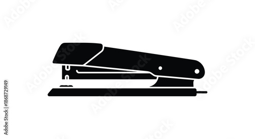 A striking black and white depiction of a common office supply the stapler silhouette