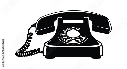 A striking black and white image depicting a classic rotary telephone in silhouette