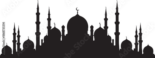 Mosque silhouette at dusk with minarets and domes