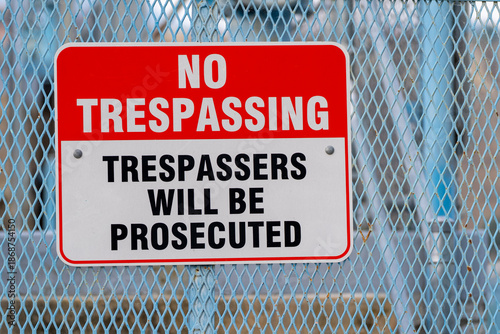 Slika na platnu No trespassing sign on a blue steel protective wall made out of expanded metal