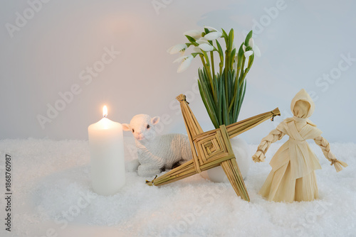 Imbolc pagan festival celebrating brigid cross and snowdrops © vetre