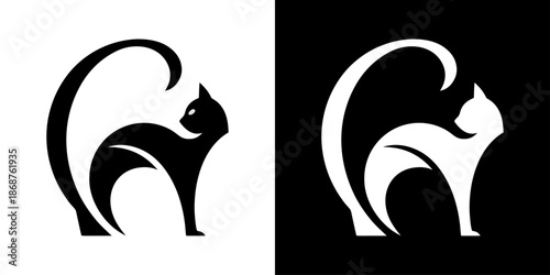 Two stylized cats in opposing color schemes black on white and white on black