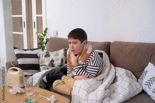 Sick boy touching neck unwell coughing with sore throat pain,bronchitis,Bronchial Asthma,Tuberculosis,pneumonia,covid-19,eco air pollution pm2.5.insurance and hospital