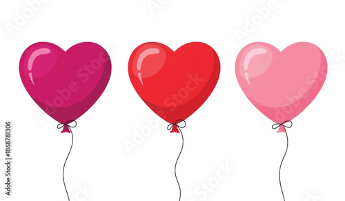 Three heart shaped balloons in pink, red, and magenta colors