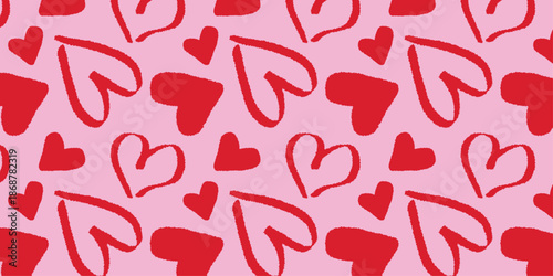 Seamless abstract pattern of hand drawn red hearts on a pink background. Vector illustration for for Valentine's Day, wedding invitations 