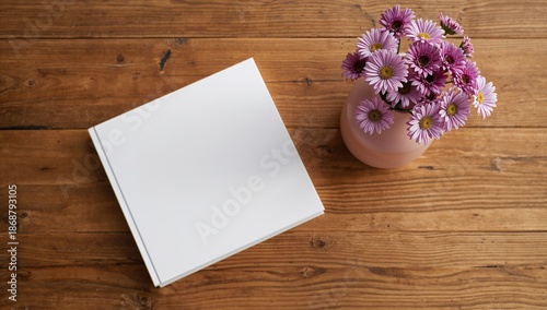 Open Book and Flower Vase on Wooden Table During Daytime With Natural Light