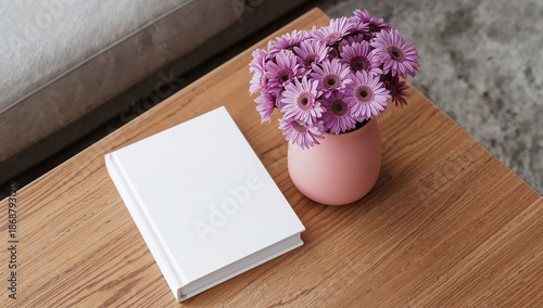 Open Book and Flower Vase on Wooden Table During Daytime With Natural Light