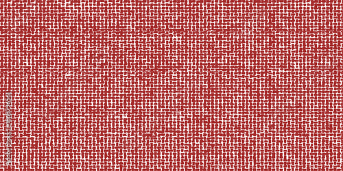 A macro shot of a rough red carpet fabric texture shows a woven textile material with a deep fiber pattern suitable for a wallpaper background or surface design