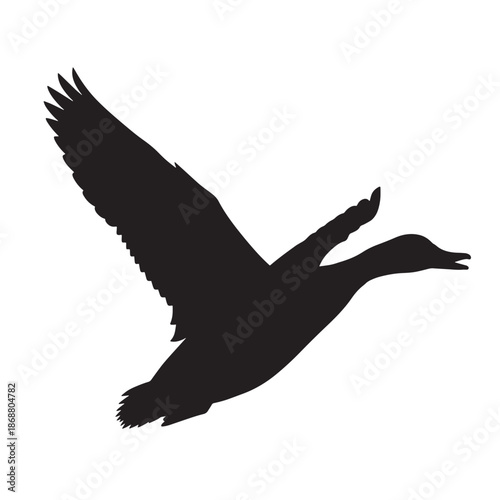 Majestic Black Silhouette of a Duck in Full Flight