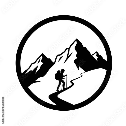 Hiker with backpack on mountain trail.