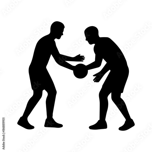 Basketball players competing for ball in silhouette