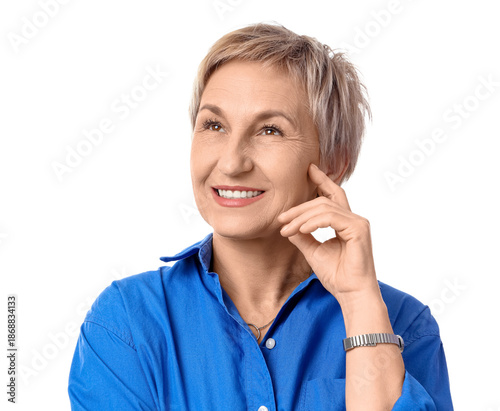 Thoughtful mature woman wit...