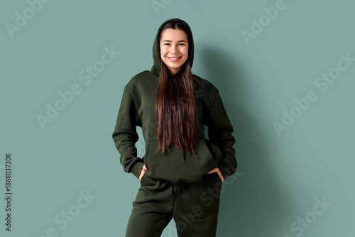 Young woman in khaki sports...