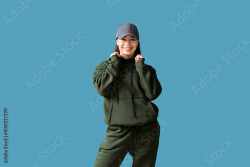 Young woman in khaki sports...