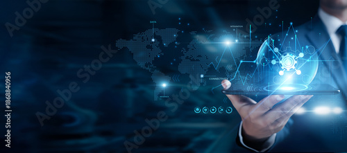 Fotografi Businessman using the tab and analyzing API data, software integration, app conn