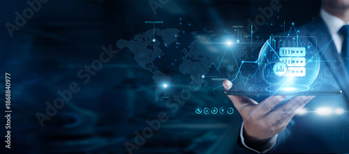 Businessman using the tab and analyzing big data, large datasets, analytics, AI integration, predictive modeling, business insights, cloud computing, data trends, technology solutions