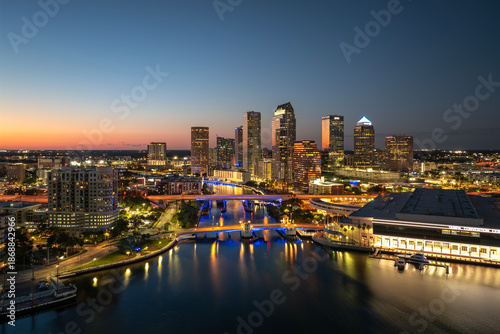 Wallpaper Mural Tampa, Florida. Downtown district of American city after sunset with brightly illuminated high buildings and highway bridge traffic. USA travel destination. Torontodigital.ca