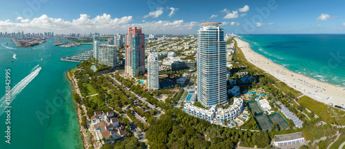 Wallpaper Mural Tourism infrastructure in southern USA. South Beach sandy surface with tourists relaxing on hot Florida sun. Miami Beach city with high luxury hotels and condos Torontodigital.ca