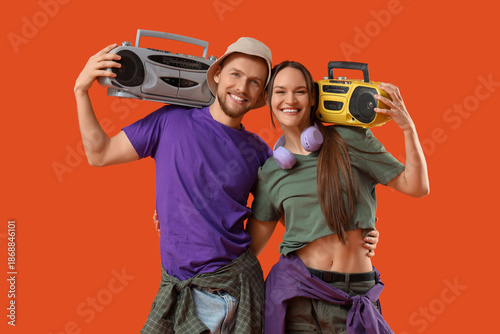 Young couple with boombox o...