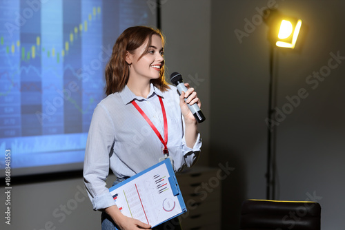 Female business speaker wit...