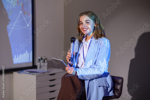 Female business speaker wit...