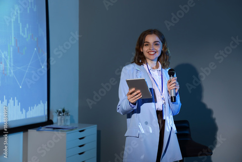 Female business speaker wit...