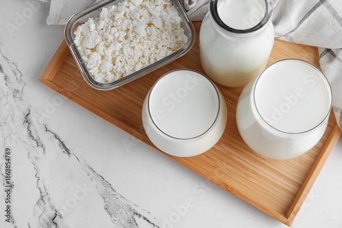 Bottle and glasses of kefir...