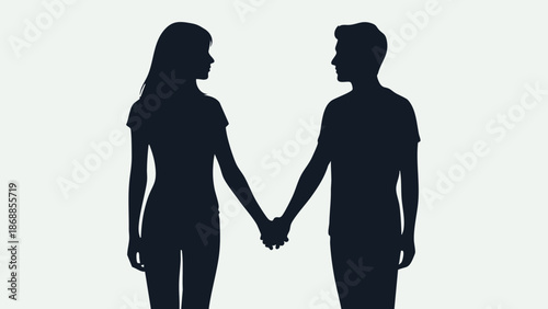 Silhouette of a loving couple holding hands together