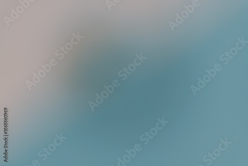Abstract defocused gradient in cool blue and gray tones, creating a calm minimal background suitable for corporate design, technology themes, and copy space.